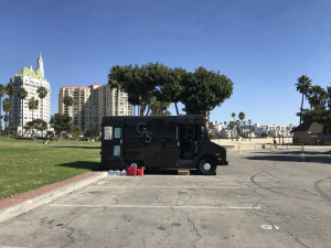 Gas in parking lot with water bottles