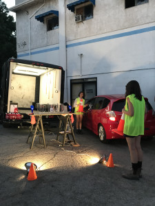 Performers arranging cones