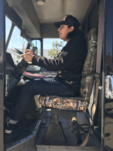 driver sitting at wheel of Gas