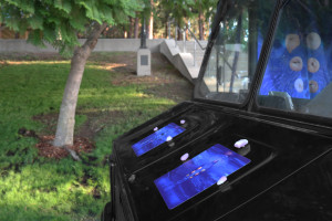 artworks mounted on front hood of Gas gallery van