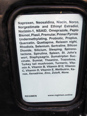 take care, exhibition install shot, text in window