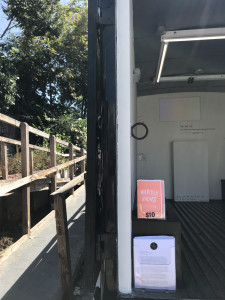 zines for sale in back of Gas