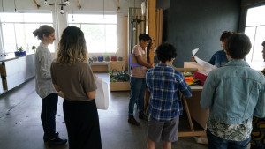 people looking at paper and craft supplies